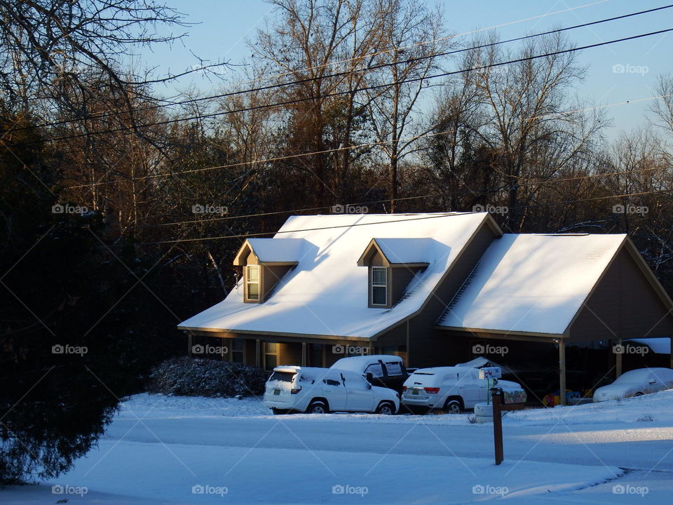 Sunlit Snowy Rooftop