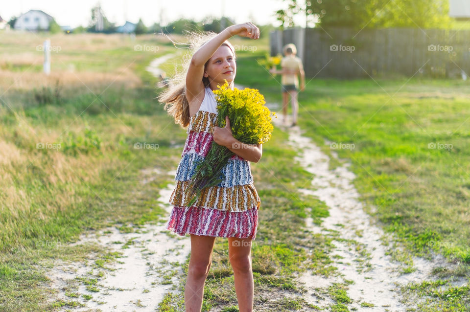 Girl with a bouquet of flowers