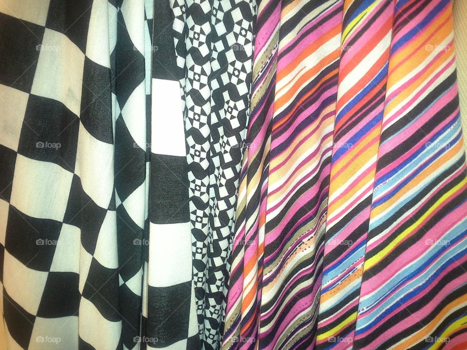 a bunch of fabrics with very different patterns all folding into this interesting blend