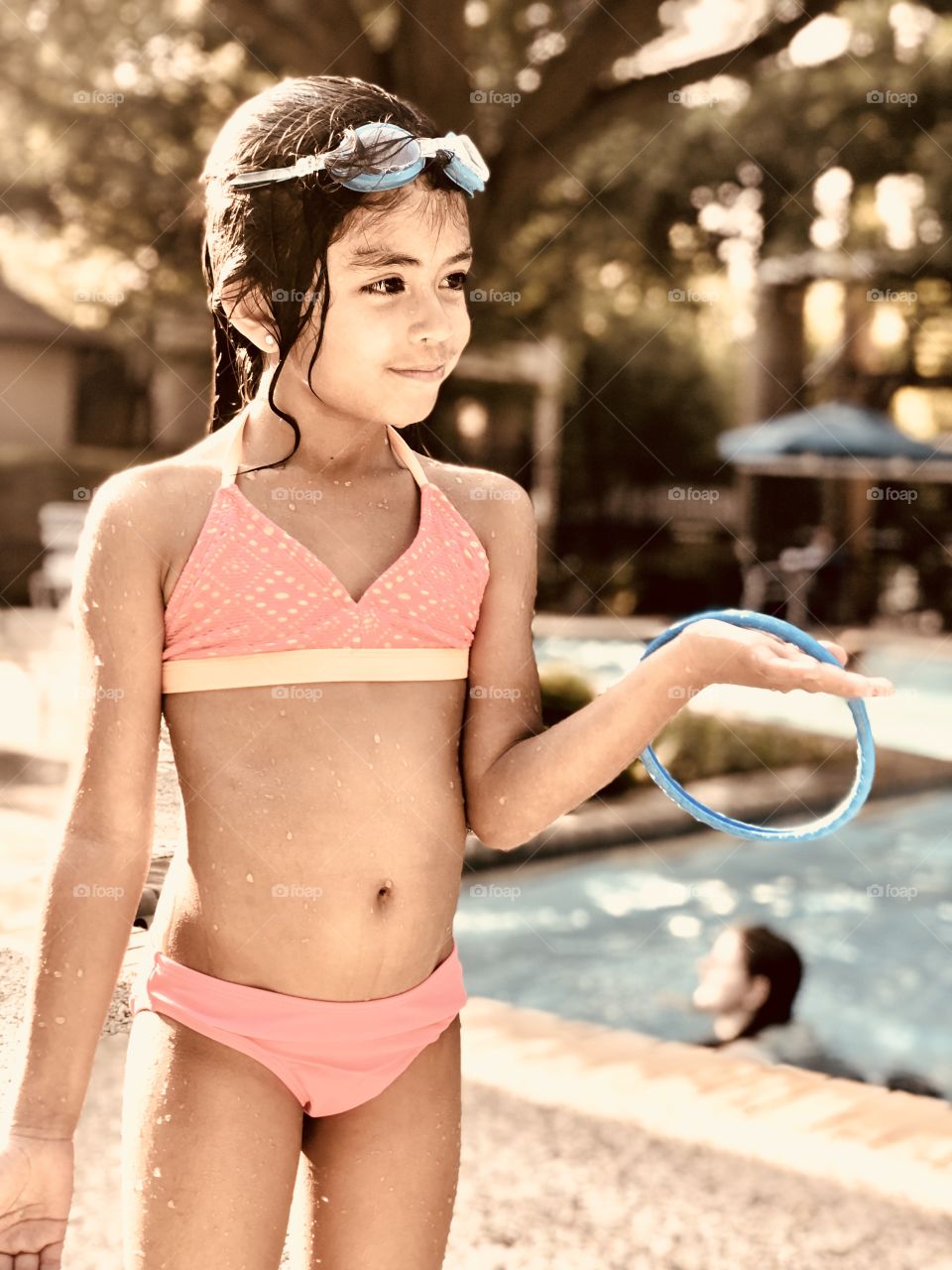 My daughter posing by the pool this summer