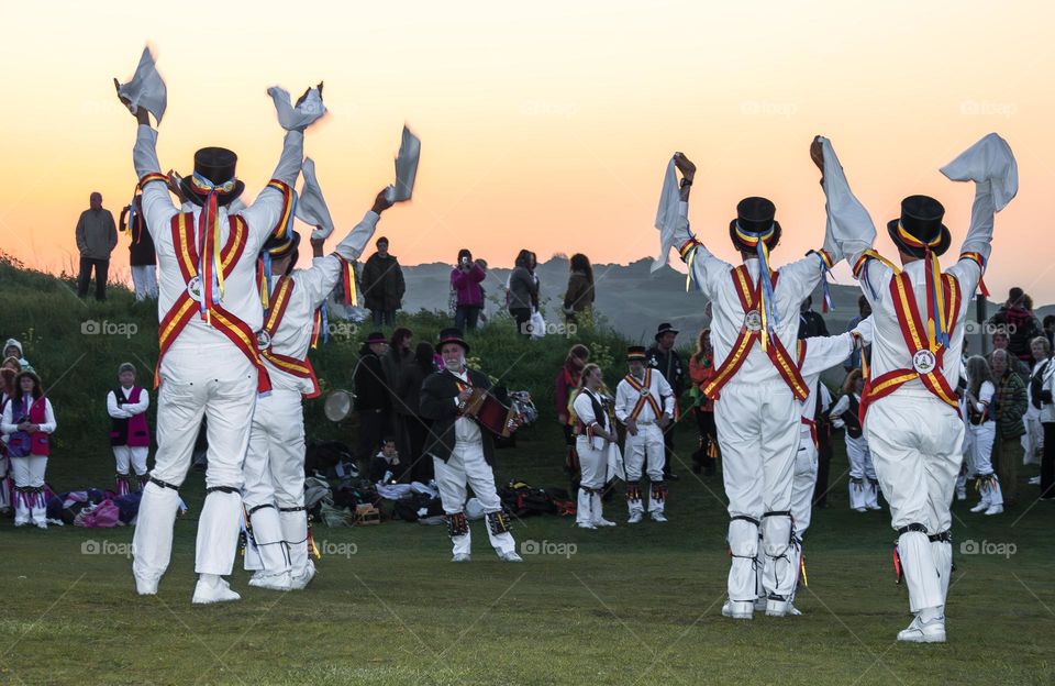 Morris Dancers on May Day in Hastings, UK dance in the dawn