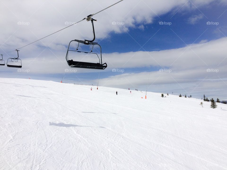 View of ski lift in snowy landscape