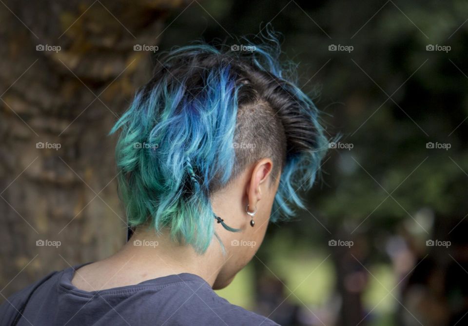 Blue hair, people in the crowd, pride fashion