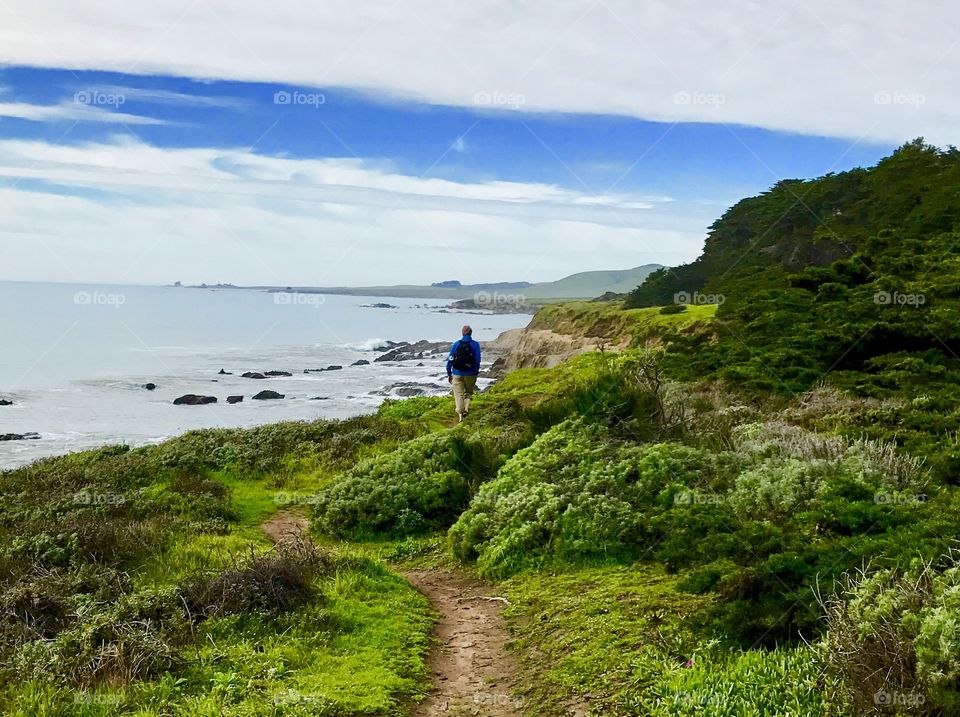 Quiet walk by the sea