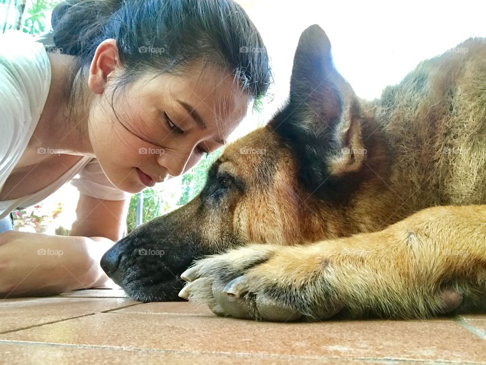 Big dog and big girl framing together on holiday 