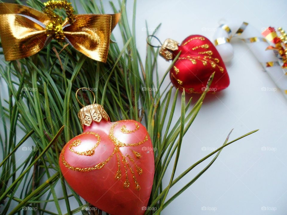 Christmas balls and pine branches on a white background