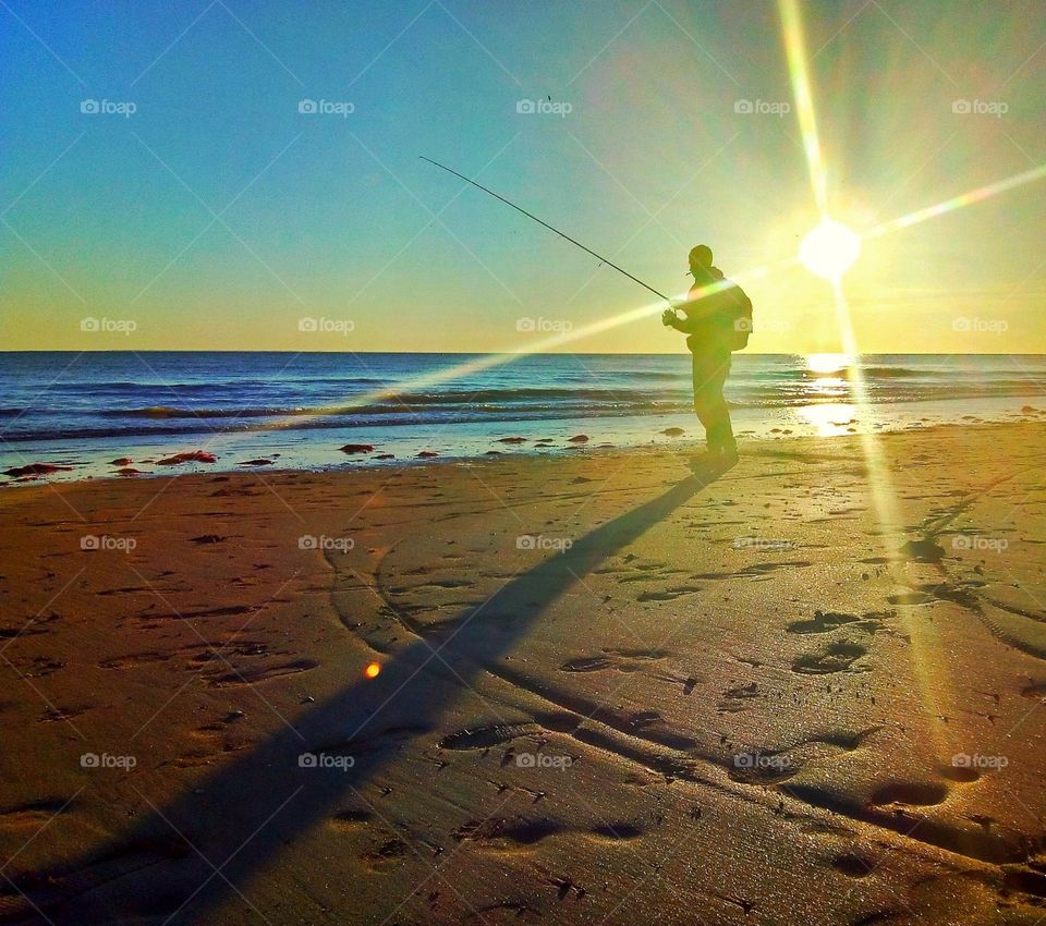 Fisherman on the beach