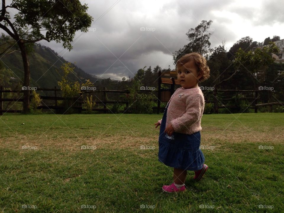 Little girl in Guapulo gardens
