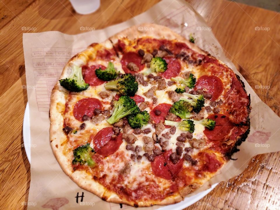 Pepperoni sausage pizza with broccoli