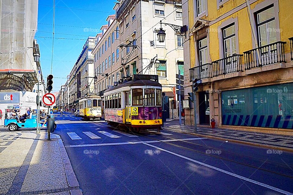 Explore the city of Lisbon in a yellow local tram 