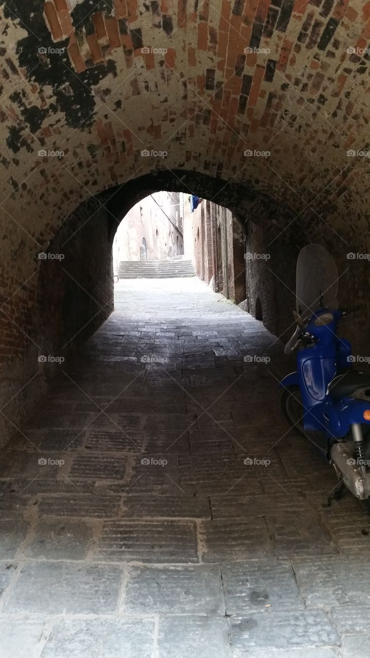 moped parked in tunnel
