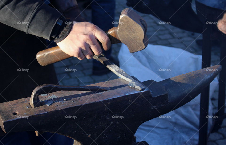 Hammering blacksmith.