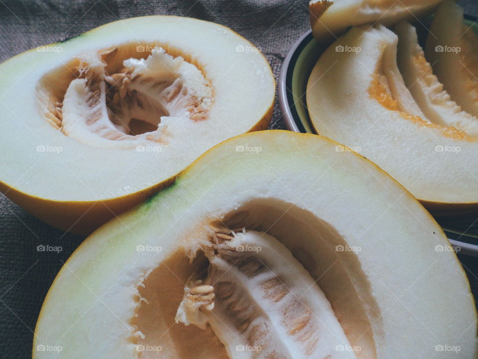 sliced ​​melon lie on the table