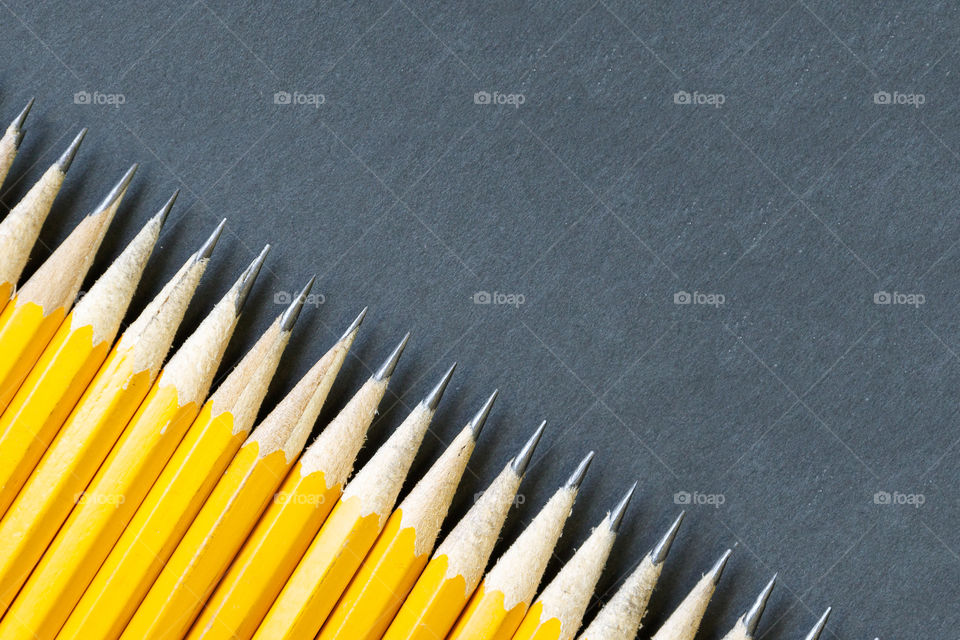 sharp #2 pencils on a black background