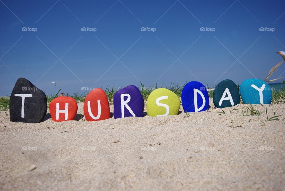 Thursday, fourth day of the week on colourful stones