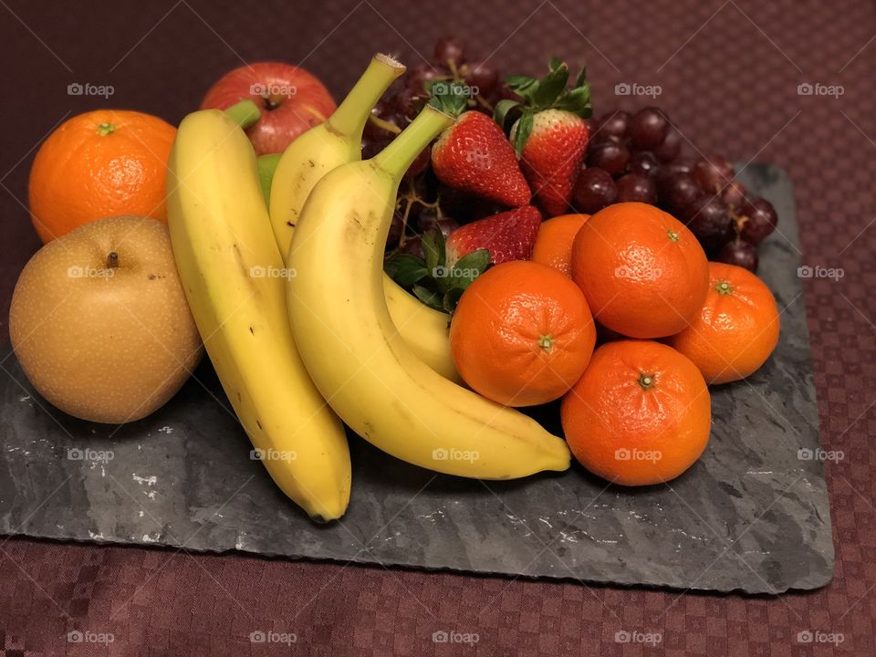 Unsliced Presented beautifully fruit platter. For a special wedding ceremony 
