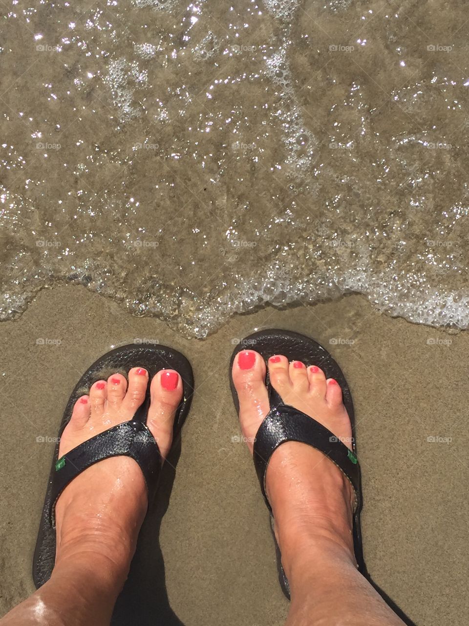 Flip flos in the sand. Life is good!