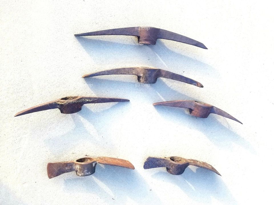 Rusted metal axe blades