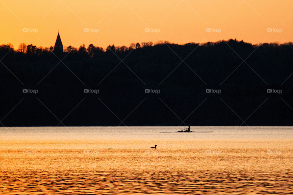 Kayaker at sunset