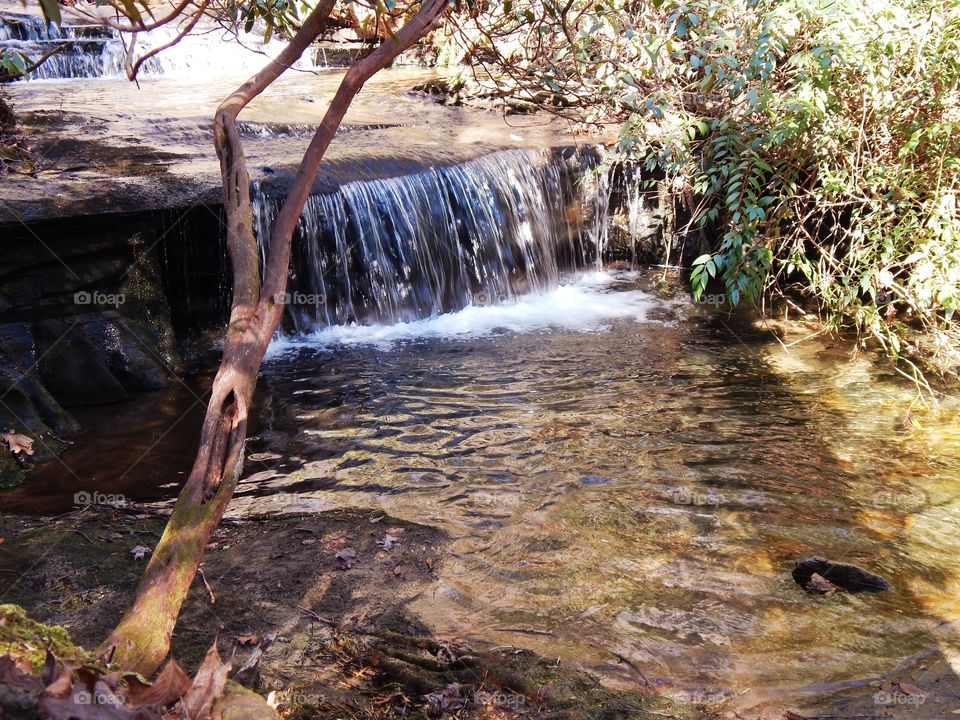 Small waterfall along the trail at Table rock state park in South Carolina