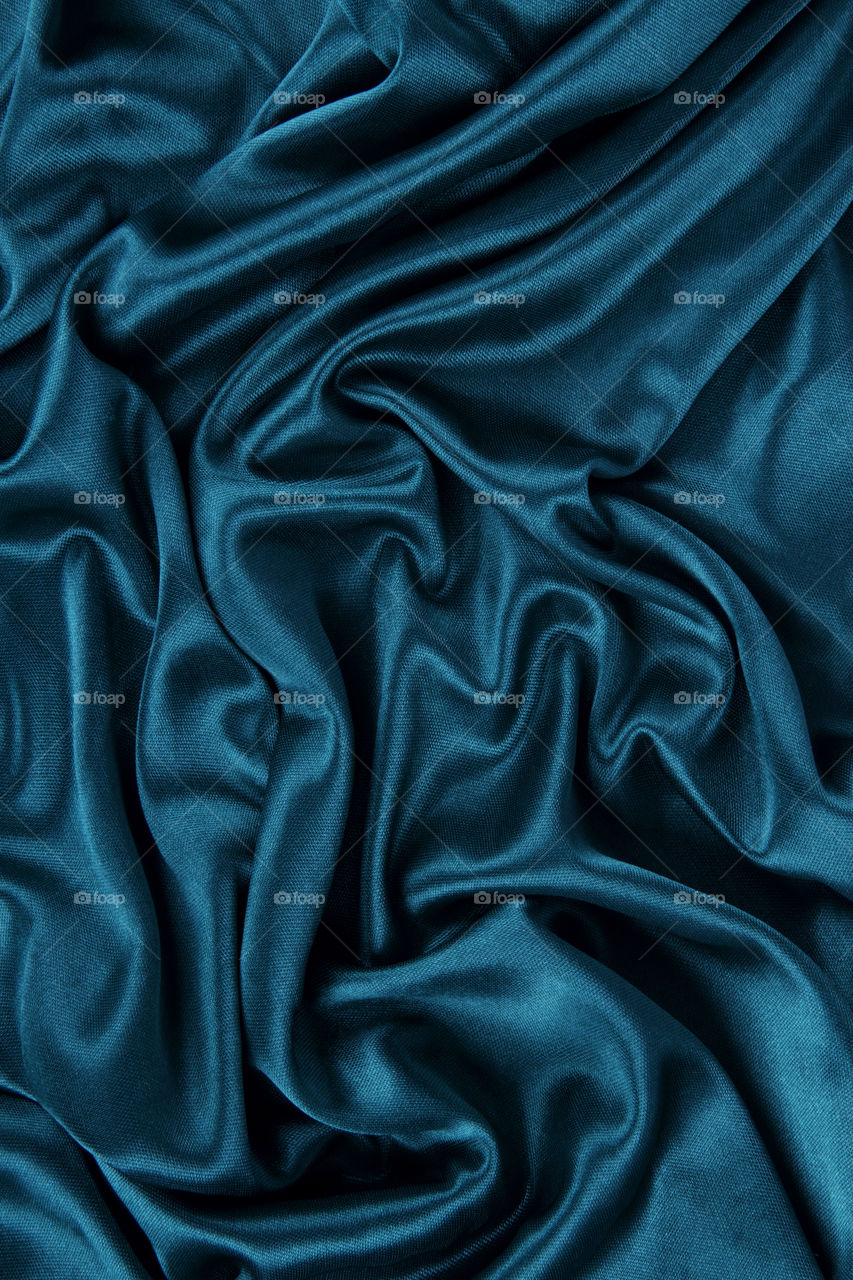 Blue satin silk velvet fabric background
