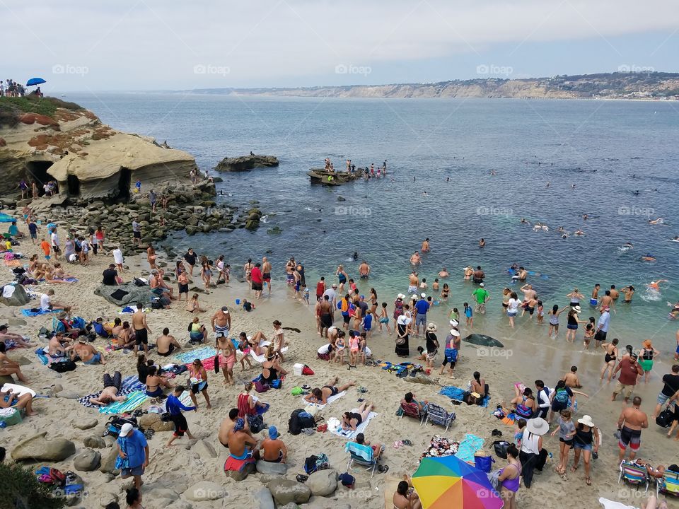 crowds in a San Diego beach