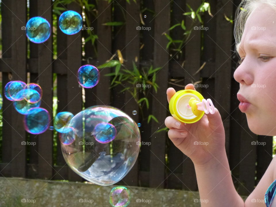 blowing bubbles