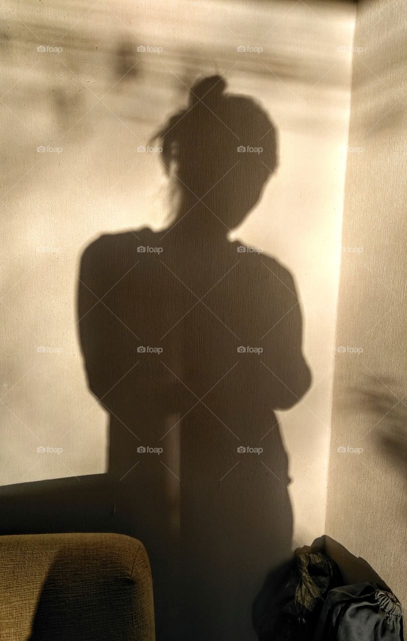 shadows girl on a wall in the room, beautiful texture abstract background