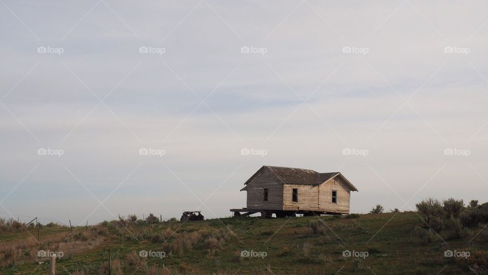 Floating abandoned wood house