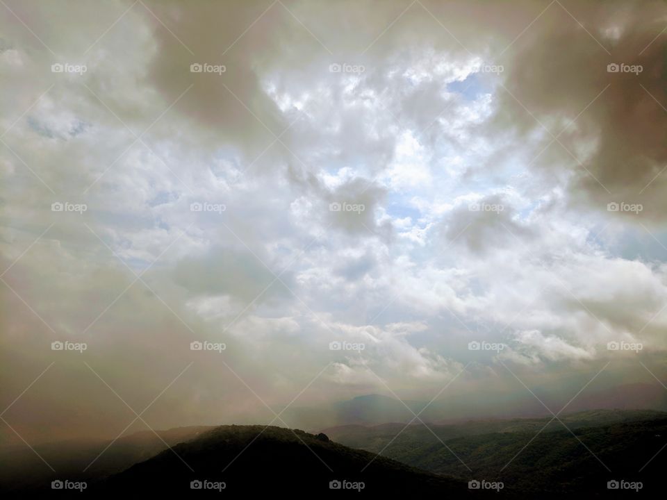 Cloudy Day from Atop Sugar Mountain  In Banner Elk, North Carolina, USA.

Alternate Title: Knocking on the Sky 4