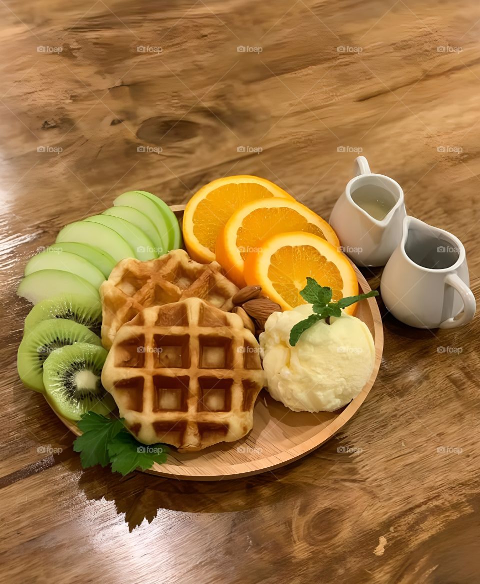 waffle with kiwi and orage ice cream