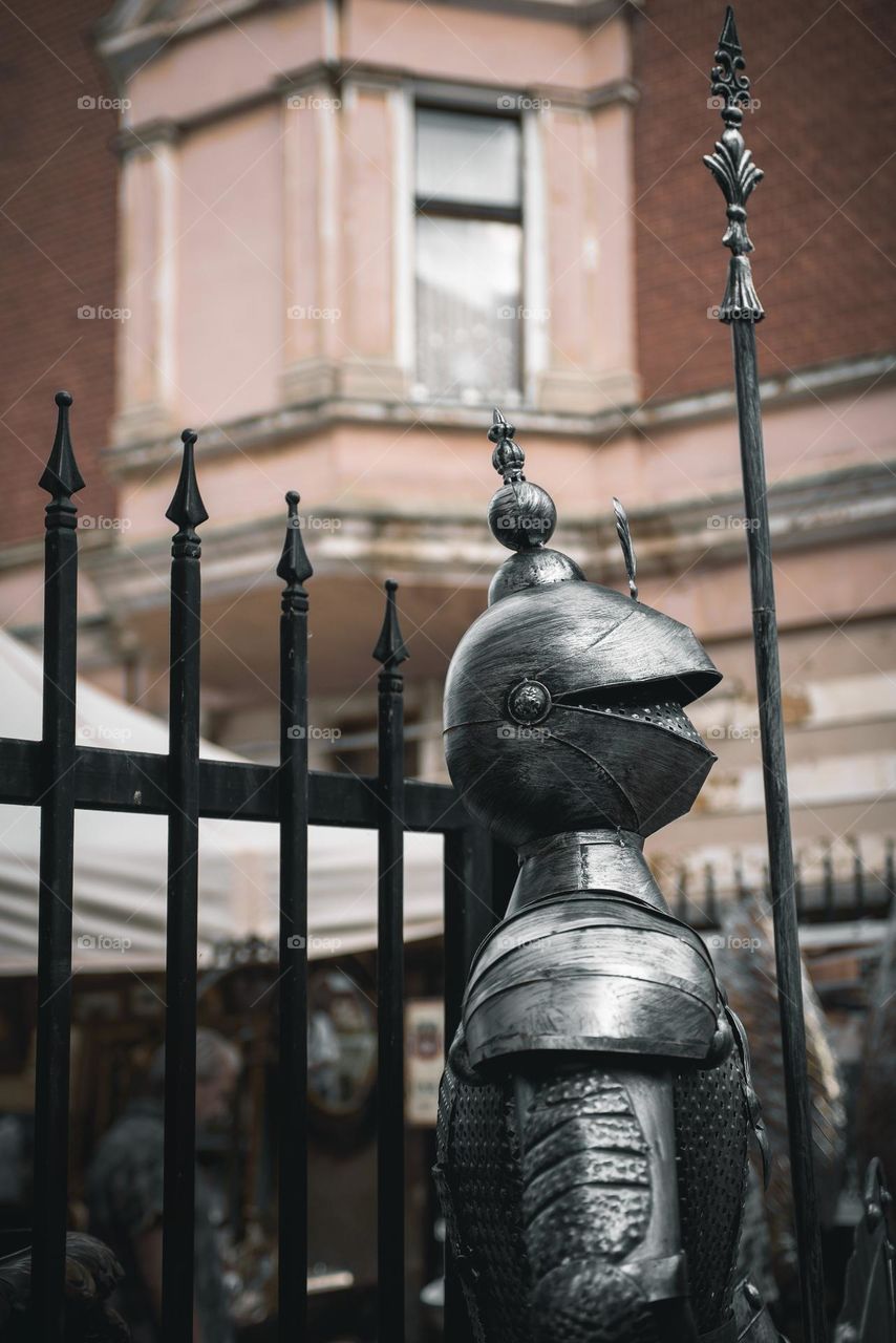 Iron armor of a medieval knight at the city fair.
