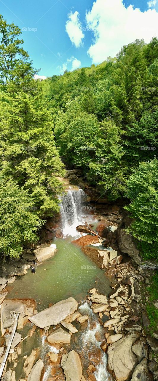 The sheer magnificence of the breathtaking waterfall at Douglas Falls! Witnessing the mountain water cascading down ancient rocks, it felt as if time stood still. One of West Virginias Hidden Gems 