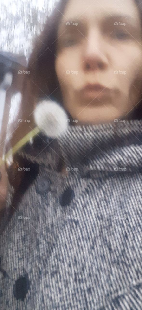 blowing a flower in the air