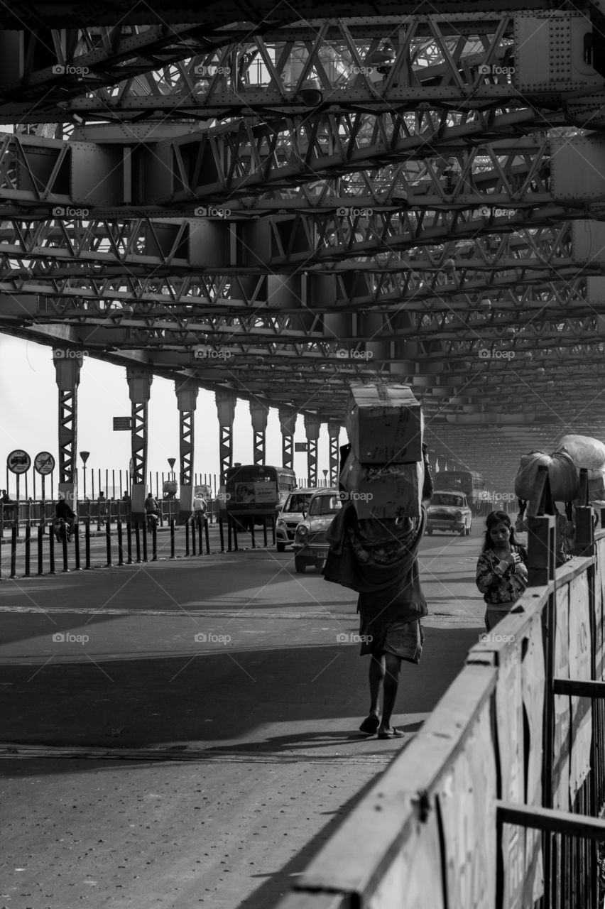 Crossing The Howrah Bridge