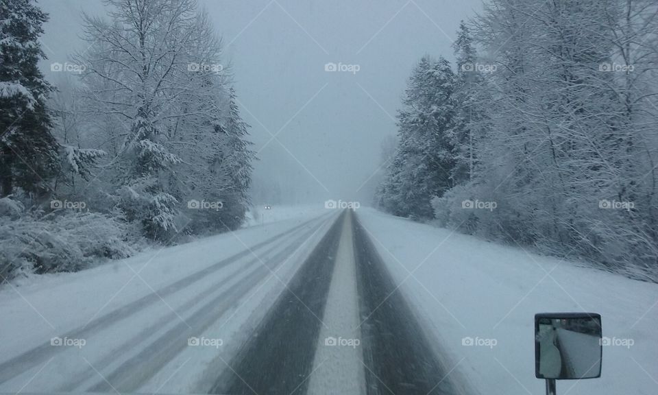 Careful Travel on dangerous icy roads in the mountains.
