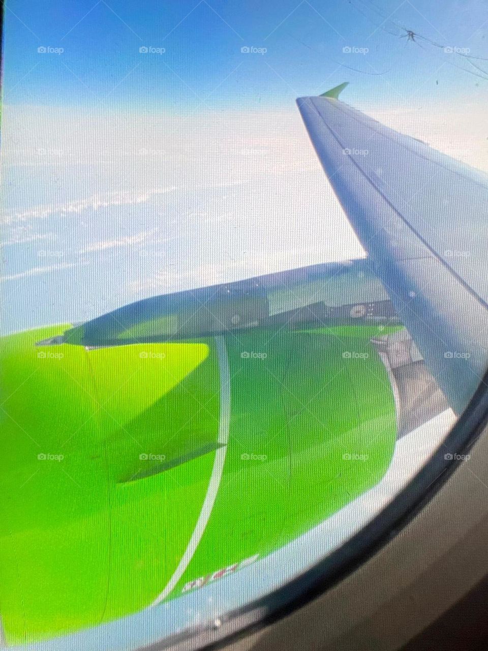 beautiful view of the sky and clouds from the window of the plane