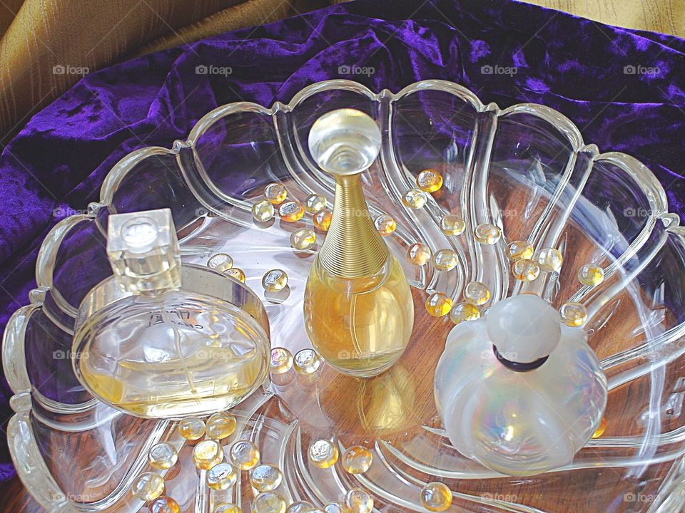 Perfume bottles on glass 