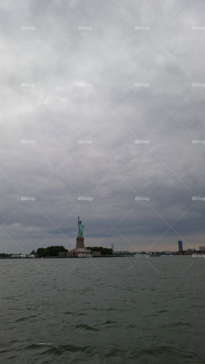 statue of liberty on a cloudy day