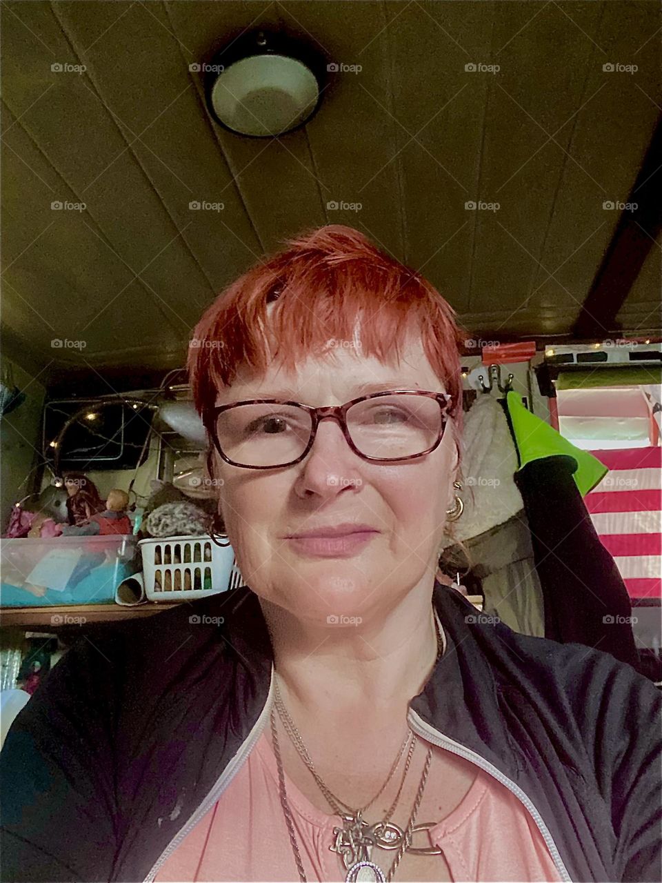 This is me, “Petra Schiller” a.k.a. “Maxine Firefox” aboard “Salvation”, our “28 ft 1969 Luhrs” cabin cruiser at “Newtown Creek” by the “Pulaski Bridge” in LIC, Queens. I live on this boat with my partner “Timothy Trespas”. 2023. Hypnotic Productions