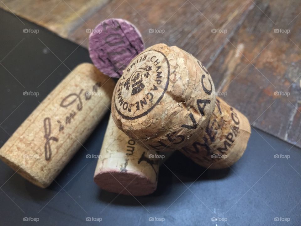Wine and champagne corks on wood and metal 