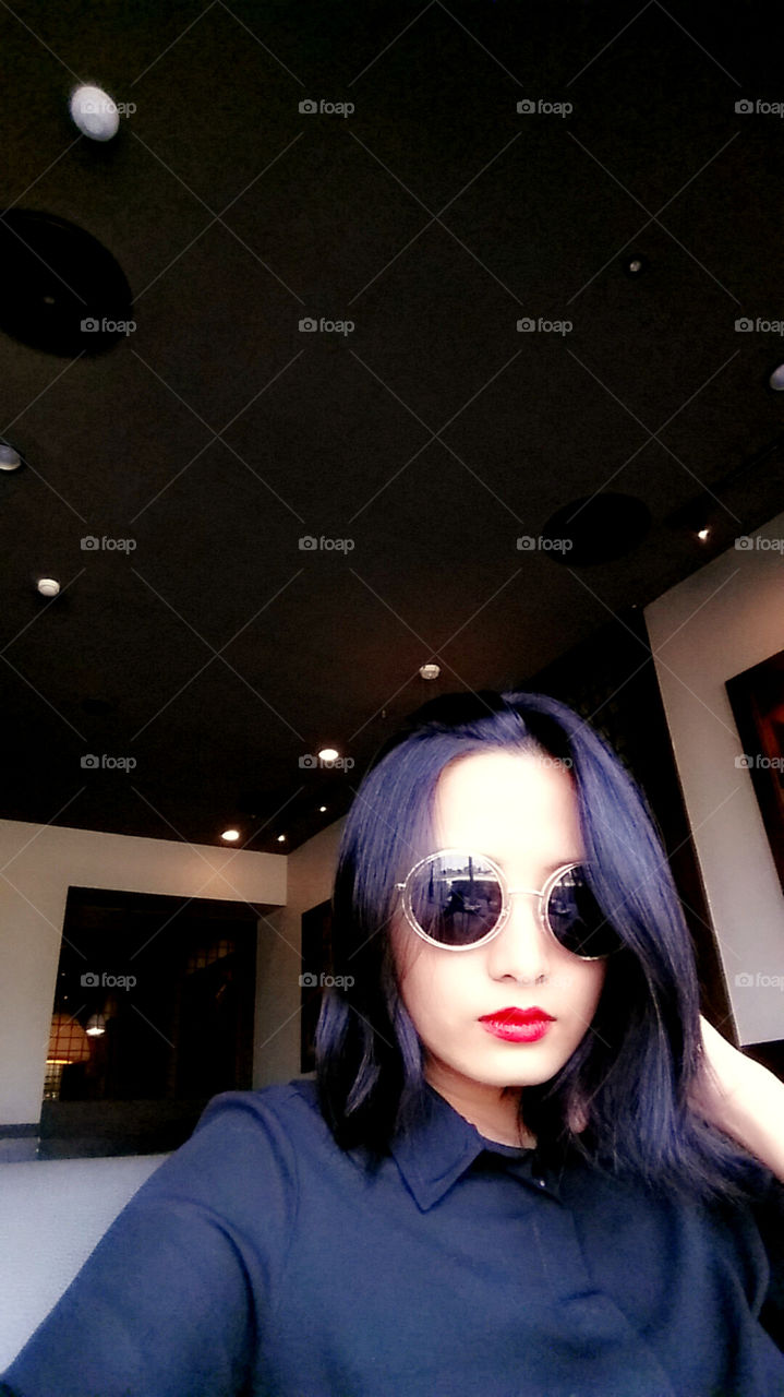 Me myself with short hair style and sun glasses in Thailand