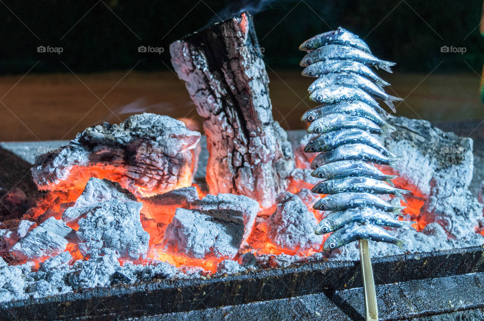 The espeto de sardina is a dish typical of Malaga cuisine, which consists in spitting, that is, stringing fish, traditionally sardines, in thin and long rods, to roast it with wood in the sand of the beach in malaga costa del sol spain