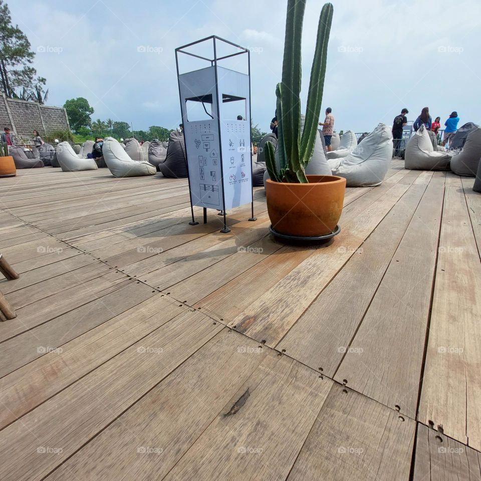 outdoor cafe table chairs in bogor with a view of geulis mountain