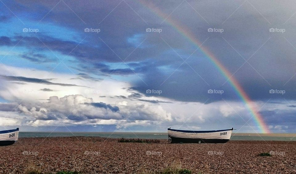 Rainbow Sky At The Beach