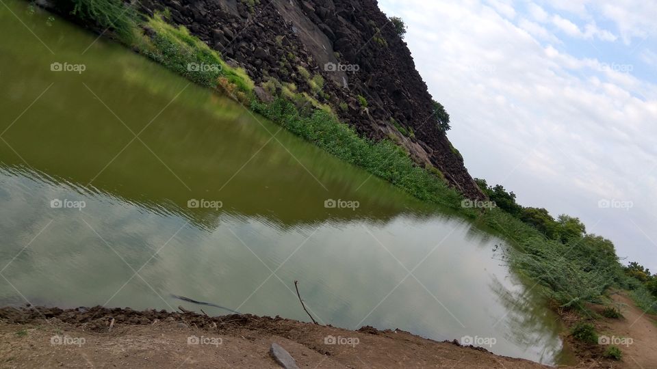 reflection of hill shade in water it's lovely