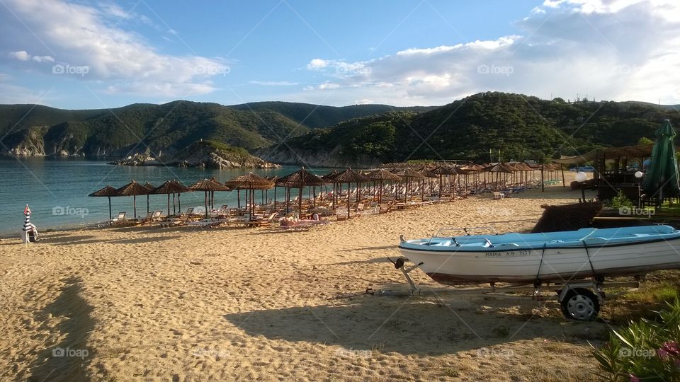 Sunny Kalamitsi beach Greece. Summer time in Greece