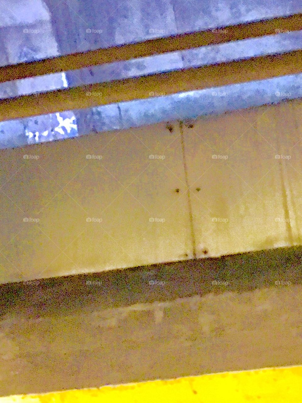 Another look at the urban infrastructure of “New York City”, in particular the subway system: Plates of metal are fastened together using nuts and bolts. 2020. Hypnotic Productions