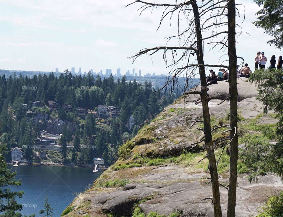Fabulous picnic spot, little hike starting in Deep Cove, North Vancouver, British Columbia, Canada .. tucked into a hearty sandwich with local donuts for dessert .. views were spectacular .. if you look closely you can see skyscrapers in Vancouver🇨🇦