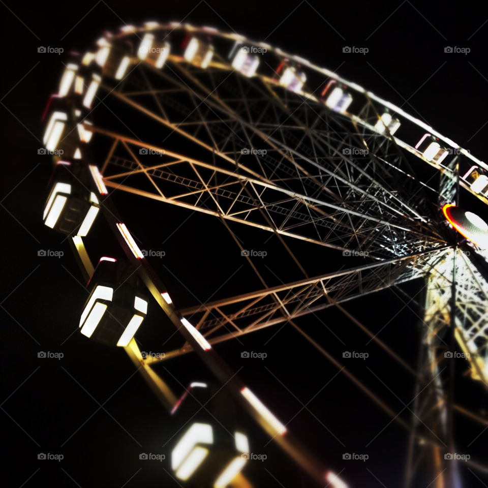 A ferris wheel in the dark